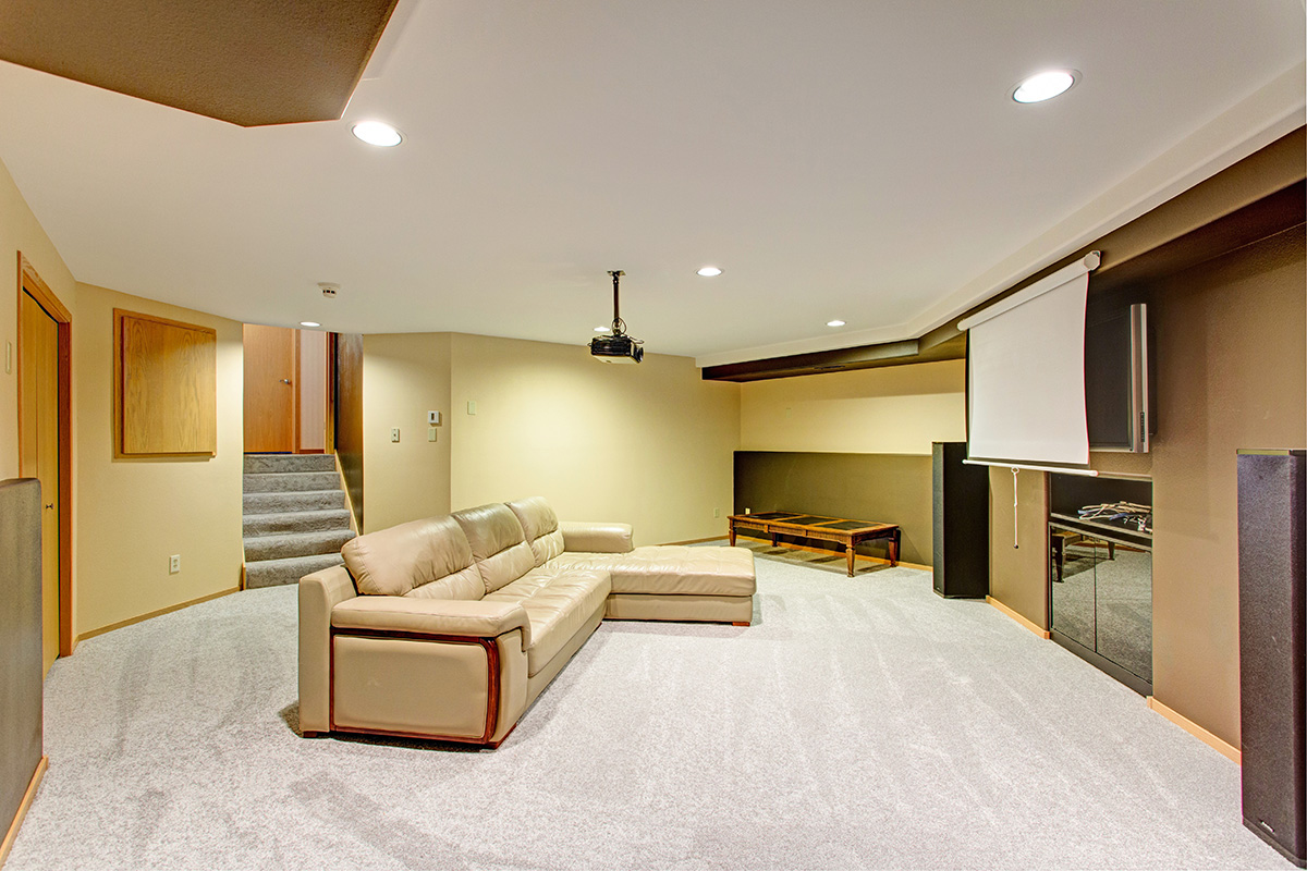 Modern Basement with light colors for walls and ceilings